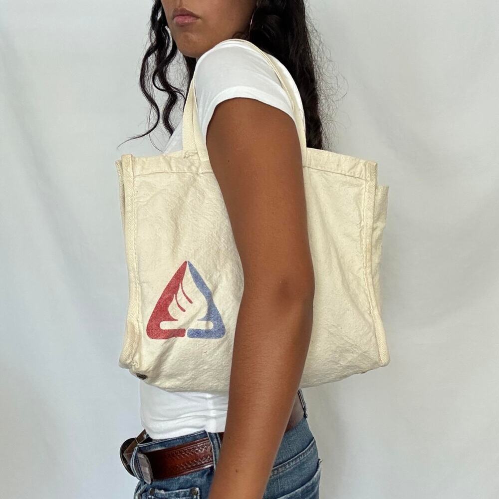 Vintage small canvas tote bag graphic with silver metal feet rectangle